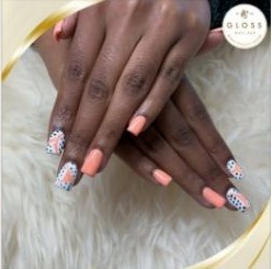 Gloss Nail Bar coral and dotted manicure from Facebook